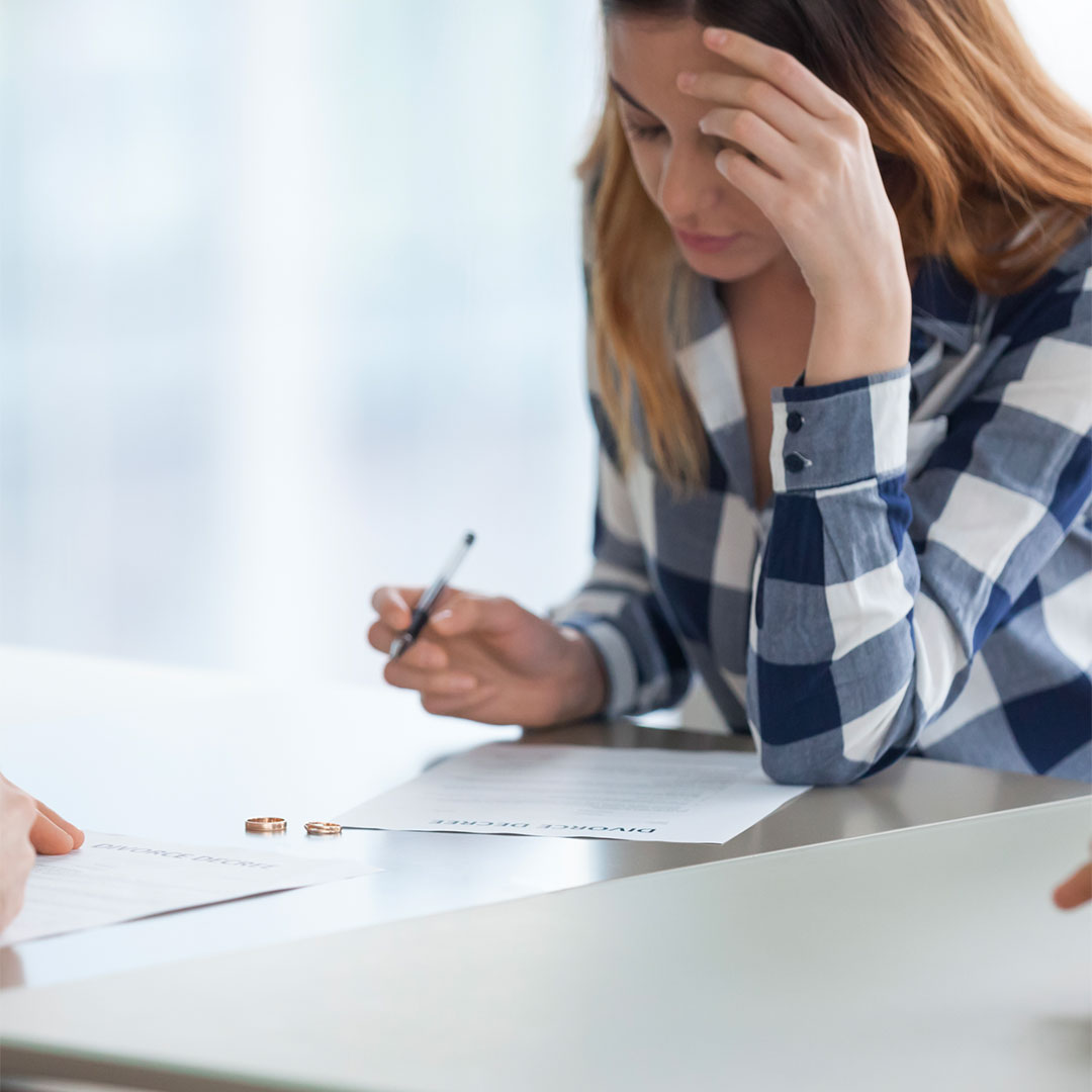 Divorce Anulment Women Signing Paperwork